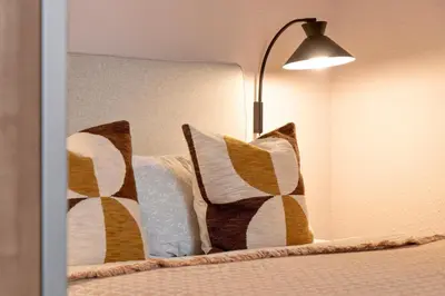 Ein Bett oder Betten in einem Zimmer der Unterkunft Salon am Schlossberg