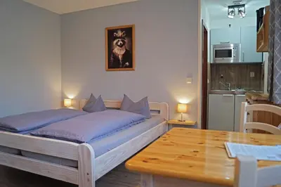 Ein Bett oder Betten in einem Zimmer der Unterkunft BodeBude