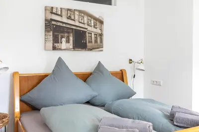 Ein Bett oder Betten in einem Zimmer der Unterkunft Hotel Alte Färberei