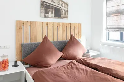 Ein Bett oder Betten in einem Zimmer der Unterkunft Hotel Alte Färberei