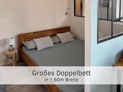 Ein Bett oder Betten in einem Zimmer der Unterkunft Bude im Harz - Perfekt für Zwei plus Hund, Wanderer, Biker, Ruhesuchende, sonnige Loggia
