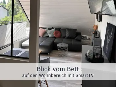 Ein Sitzbereich in der Unterkunft Bude im Harz - Perfekt für Zwei plus Hund, Wanderer, Biker, Ruhesuchende, sonnige Loggia