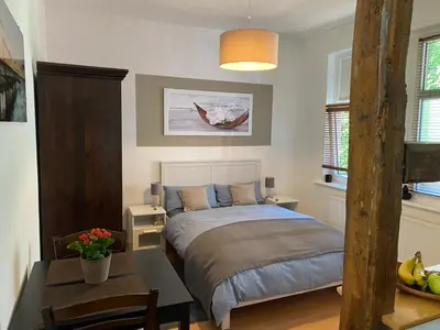 Ein Bett oder Betten in einem Zimmer der Unterkunft Ferienwohnung Casa Conti Goslar