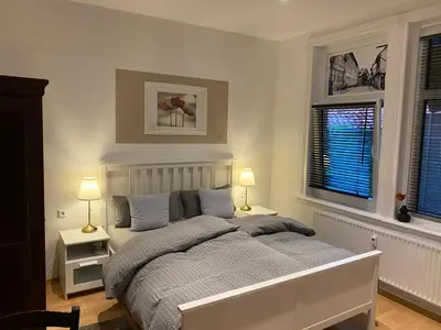 Ein Bett oder Betten in einem Zimmer der Unterkunft Ferienwohnung Casa Conti Goslar