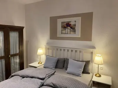 Ein Bett oder Betten in einem Zimmer der Unterkunft Ferienwohnung Casa Conti Goslar