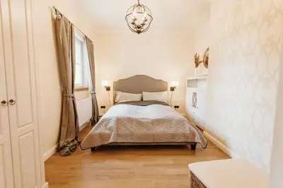 Ein Bett oder Betten in einem Zimmer der Unterkunft Waldchalet Am Steinberg FEWO