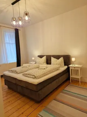 Ein Bett oder Betten in einem Zimmer der Unterkunft Zum Jakobi 5