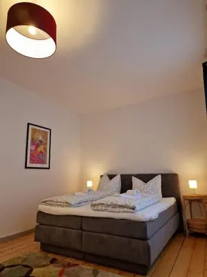 Ein Bett oder Betten in einem Zimmer der Unterkunft Zum Jakobi 5