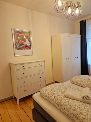 Ein Bett oder Betten in einem Zimmer der Unterkunft Zum Jakobi 5