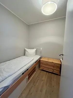 Ein Bett oder Betten in einem Zimmer der Unterkunft Hahnenklee‘r Berg-Glück II - modernes Apartment