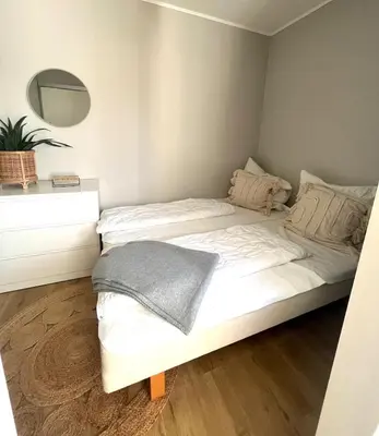 Ein Bett oder Betten in einem Zimmer der Unterkunft Hahnenklee‘r Berg-Glück II - modernes Apartment