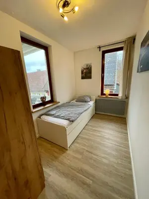 Ein Bett oder Betten in einem Zimmer der Unterkunft Ferienwohnung Donald