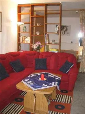 Ein Sitzbereich in der Unterkunft Ferienwohnung Klingelhöfer E-III-2-6