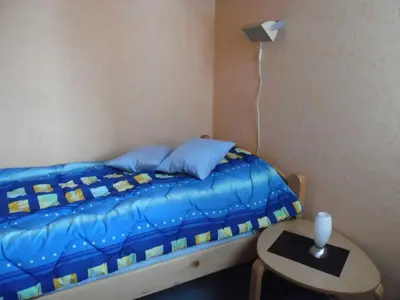 Ein Bett oder Betten in einem Zimmer der Unterkunft Ferienwohnung Schützenklippe G-II-2-4