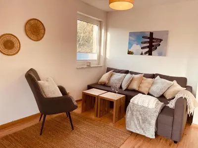 Ein Sitzbereich in der Unterkunft Apartment an der Wurmbergseilbahn 3