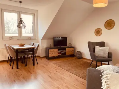 Ein Sitzbereich in der Unterkunft Apartment an der Wurmbergseilbahn 3