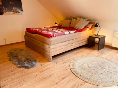 Ein Bett oder Betten in einem Zimmer der Unterkunft Apartment an der Wurmbergseilbahn 3