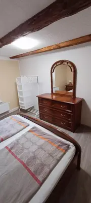 Ein Bett oder Betten in einem Zimmer der Unterkunft Ferienwohnung in Timmenrode am Harz