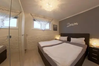 Ein Bett oder Betten in einem Zimmer der Unterkunft Apartment 256