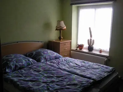 Ein Bett oder Betten in einem Zimmer der Unterkunft Ferienhaus Harzer Bauernhof