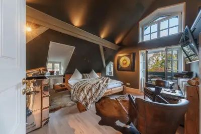 Ein Sitzbereich in der Unterkunft Villa Ottilienruh - Spitzweg-Suite
