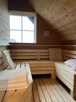 Ein Bett oder Betten in einem Zimmer der Unterkunft StrandBerg's Onkel Tommys Hütte