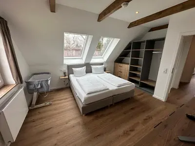 Ein Bett oder Betten in einem Zimmer der Unterkunft StrandBerg's Onkel Tommys Hütte
