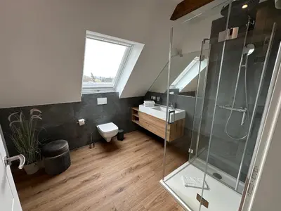 Ein Badezimmer in der Unterkunft StrandBerg's Onkel Tommys Hütte