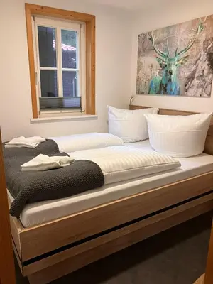 Ein Bett oder Betten in einem Zimmer der Unterkunft Steinbachhütte 1