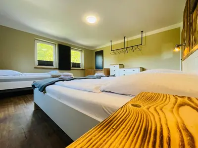 Ein Bett oder Betten in einem Zimmer der Unterkunft Große Wohnung am Bach