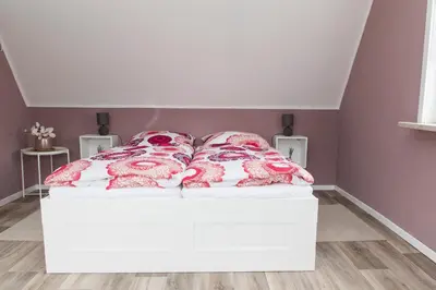 Ein Bett oder Betten in einem Zimmer der Unterkunft Ferienhaus 