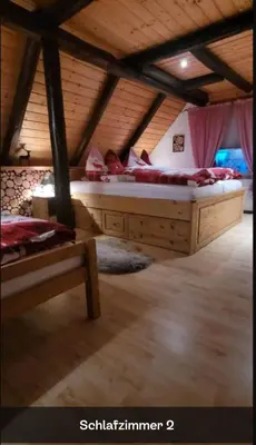 Ein Bett oder Betten in einem Zimmer der Unterkunft Ferienwohnung 