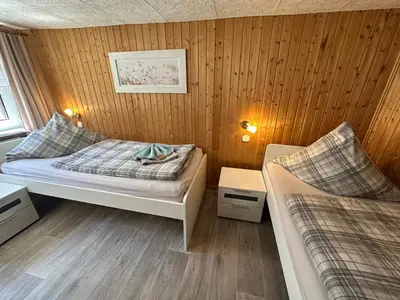 Ein Bett oder Betten in einem Zimmer der Unterkunft Christels Ferienwohnung 1 in Thale mit Sonnenterrasse und Grill