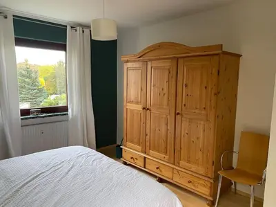 Ein Bett oder Betten in einem Zimmer der Unterkunft Die HarzSchrittMacher - Bergmann 24
