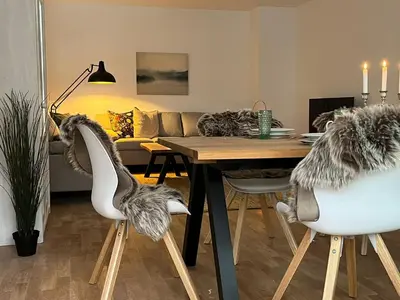 Ein Sitzbereich in der Unterkunft Ferienwohnung Wiesengrund 2