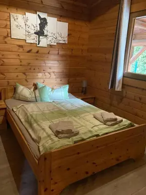 Ein Bett oder Betten in einem Zimmer der Unterkunft Ferienhaus Kröger -kostenloses Wlan-