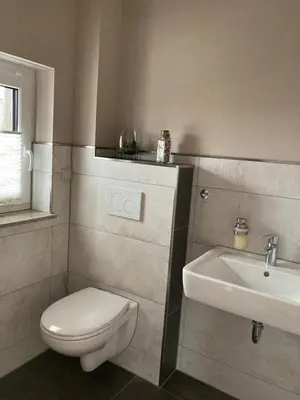 Ein Badezimmer in der Unterkunft Ferienwohnung Kröger I