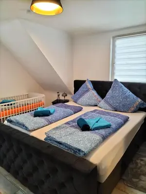 Ein Bett oder Betten in einem Zimmer der Unterkunft Goldtaler