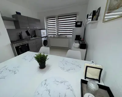 Küche/Küchenzeile in der Unterkunft FeWo Elbo46 mit Balkon, Waschmaschine & Smart TV