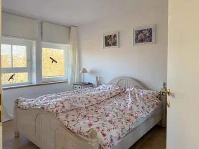 Ein Bett oder Betten in einem Zimmer der Unterkunft Casa Kronberg