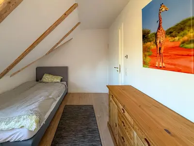 Ein Bett oder Betten in einem Zimmer der Unterkunft Casa Kronberg