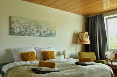 Ein Bett oder Betten in einem Zimmer der Unterkunft Zeitkapsel Braunlage