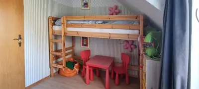 Ein Etagenbett oder Etagenbetten in einem Zimmer der Unterkunft Zeitkapsel Braunlage