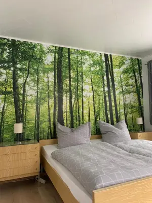 Ein Bett oder Betten in einem Zimmer der Unterkunft Ferienhaus Andrea am Bodetal