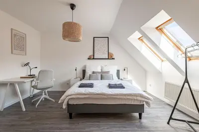 Ein Bett oder Betten in einem Zimmer der Unterkunft Modernes Apartment am Campus - Parken - Smart-TV - Kaffeevollautomat