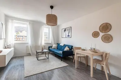 Ein Sitzbereich in der Unterkunft Modernes Apartment am Campus - Parken - Smart-TV - Kaffeevollautomat