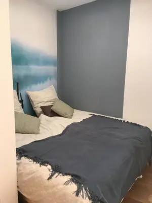 Ein Bett oder Betten in einem Zimmer der Unterkunft Waschhaus