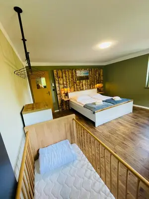 Ein Bett oder Betten in einem Zimmer der Unterkunft Haus am Bach