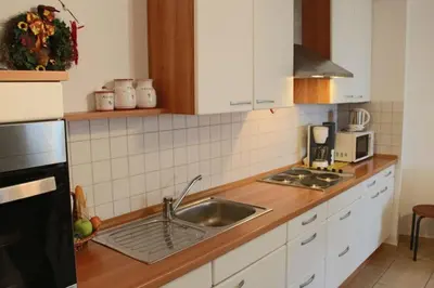 Küche/Küchenzeile in der Unterkunft Ferienwohnung Backhaus
