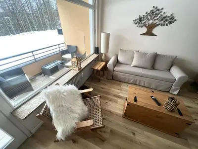 Ein Sitzbereich in der Unterkunft Mountain Lodge